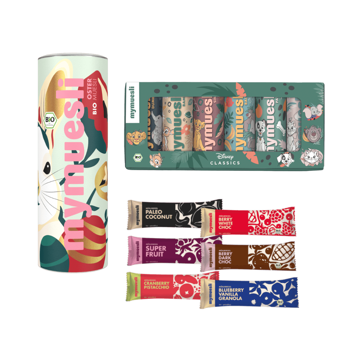 Ein mymuesli -Set auf grünem Grund: Eine bunt gemusterte Dose, eine Riegel-Box und sechs verschiedene Bio-Müsliriegel.