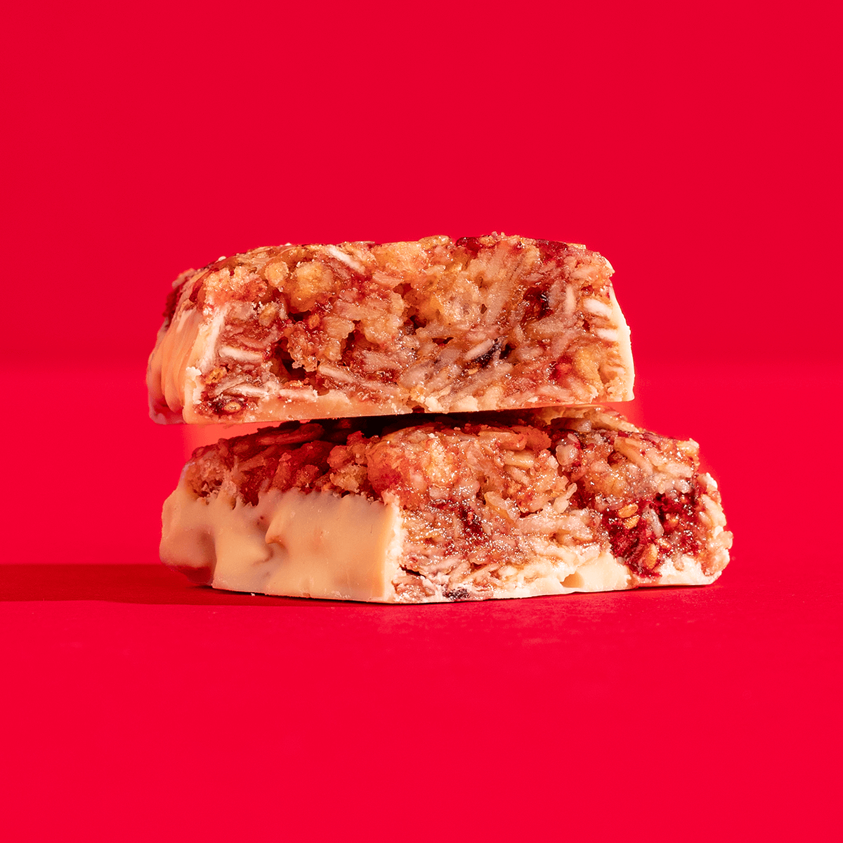 mymuesli Bio Berry White Choc Müsliriegel durchgeschnitten