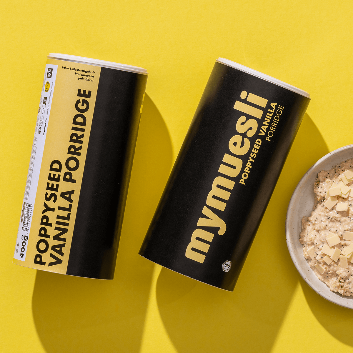 mymuesli Bio Porridge Poppyseed Vanilla Dosen mit Porridgeschüssel
