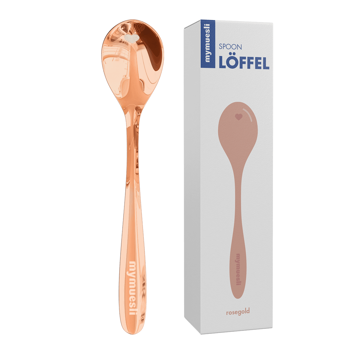 Ein glänzender, kupferfarbener mymuesli -Löffel (Rosegold) steht aufrecht neben seiner weißen Verkaufsverpackung auf schwarzem Hintergrund.