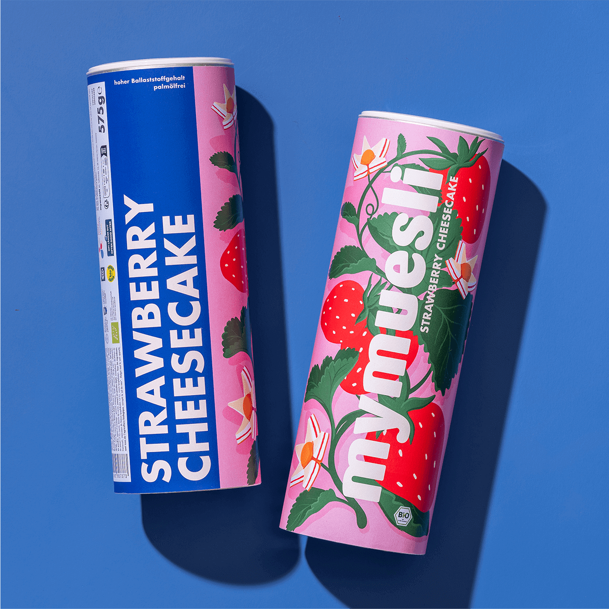 mymuesli Bio Strawberry Cheesecake Müsli Dose von Vorne und der Seite