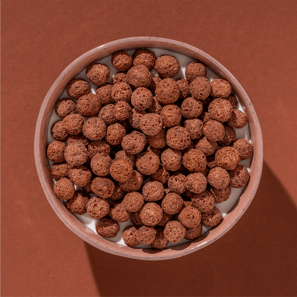 mymuesli Bio Kakao Pops in Schale mit Joghurt