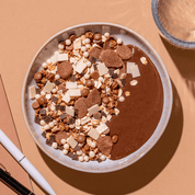mymuesli Bio Super Choc Müsli in Schale mit Schoko Pudding