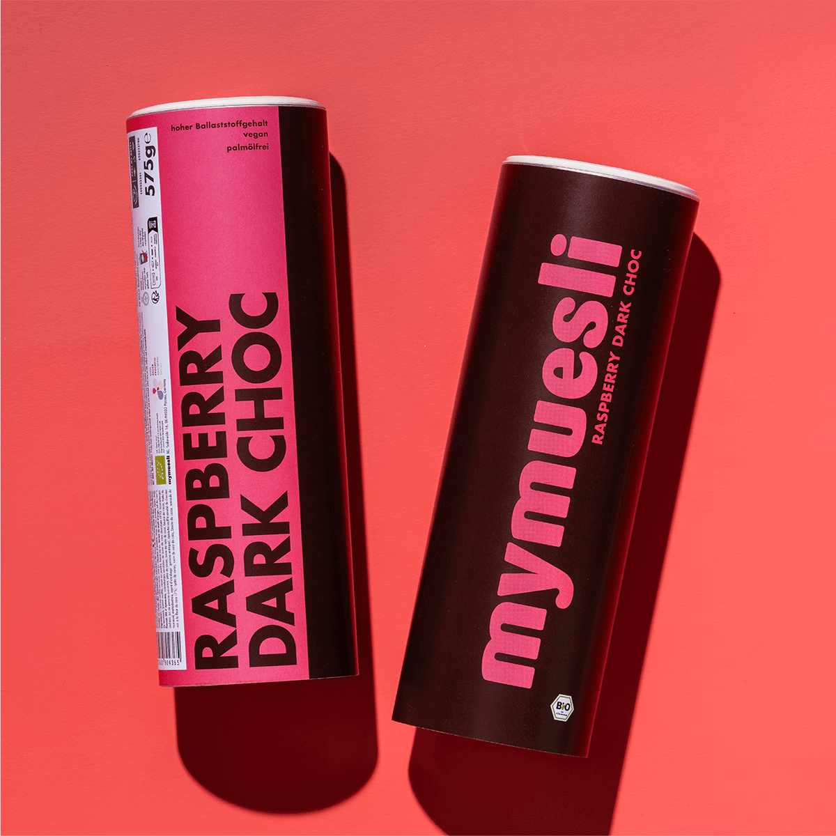 mymuesli Bio Raspberry Dark Choc Müsli Dose von Vorne und der Seite