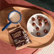 mymuesli Bio Super Choc Crunchy Bites Verpackung mit Schüssel