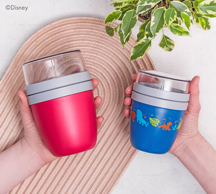 mymuesli 2go Becher magenta und 2go Becher von Disney